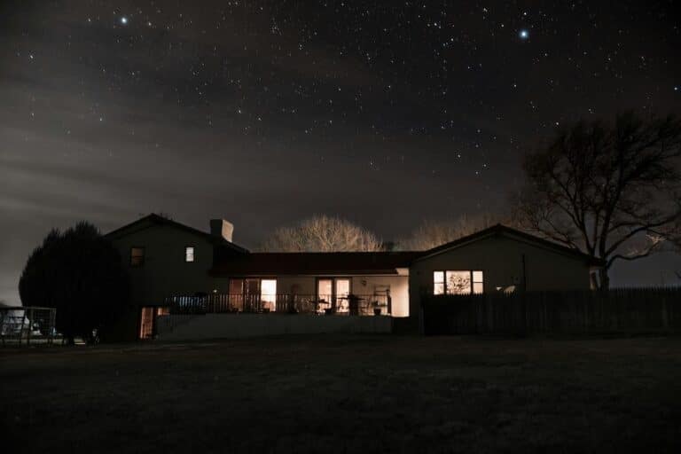 ranch-style home at night